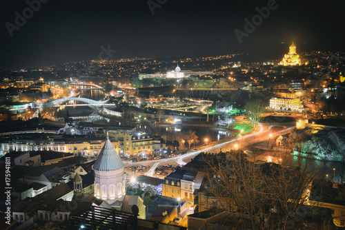 Top view of the Georgian capital Tbilisi at night © badahos