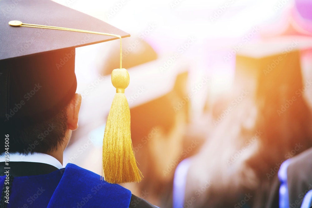 shot of graduation hats during commencement success graduates of the ...