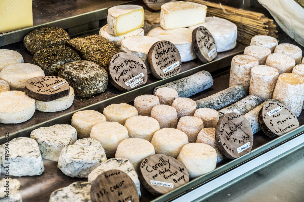 Different cheeses at open air-market. Different cheeses at open air-market.