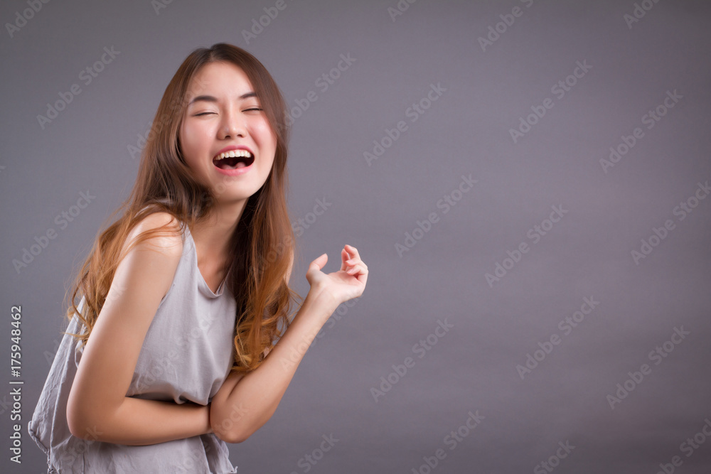 happy laughing woman isolated studio portrait with space happy laughing woman isolated studio portrait with space