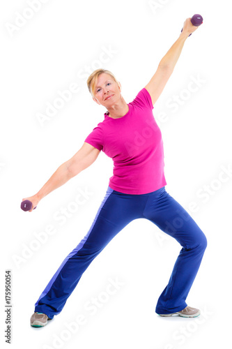 Pensioner woman sport. Full-length portrait of Old senior woman is engaged sports. Woman holding violet dumbbells and cheerfully smiling while doing sport exercises. isolated on white background