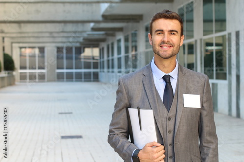 Closeup of young interesting businessman with copy space