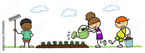 Kinder im Schulgarten pflanzen Gemüse