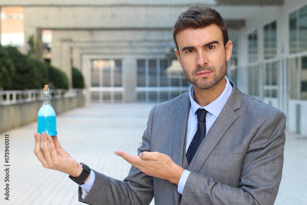 Fototapeta premium Pharmaceutical worker showing a new formula