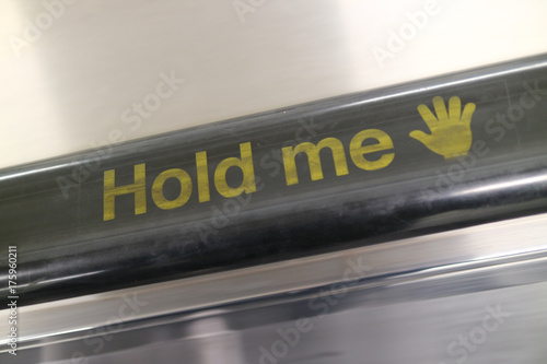 'Hold me' Escalator Handrail