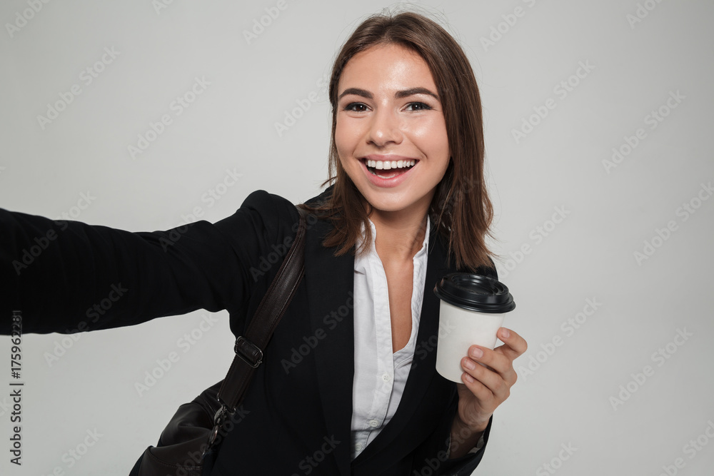 Portrait of a smiling attractive woman in suit Portrait of a smiling attractive woman in suit