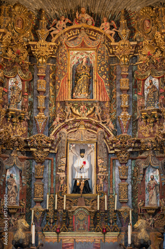 Closeup of interior wall behind the altar of the San Xavier del Bac mission church in Tucson, Arizona