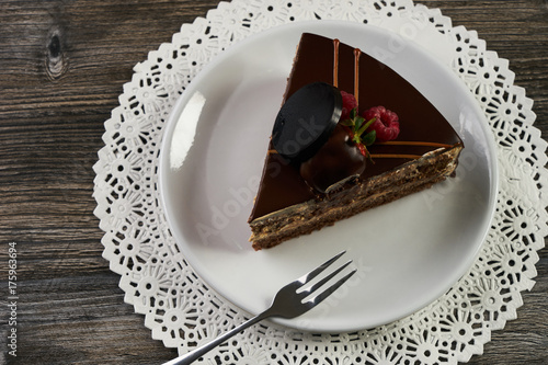 Slice of chocolate cake with chocolate cream