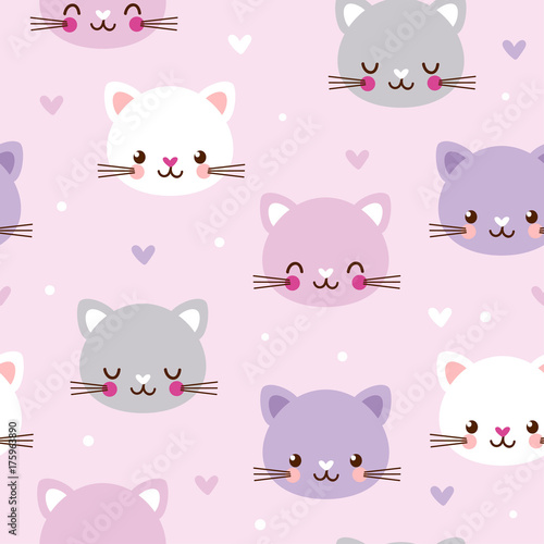 Vector seamless pattern with faces of cats on pink background.