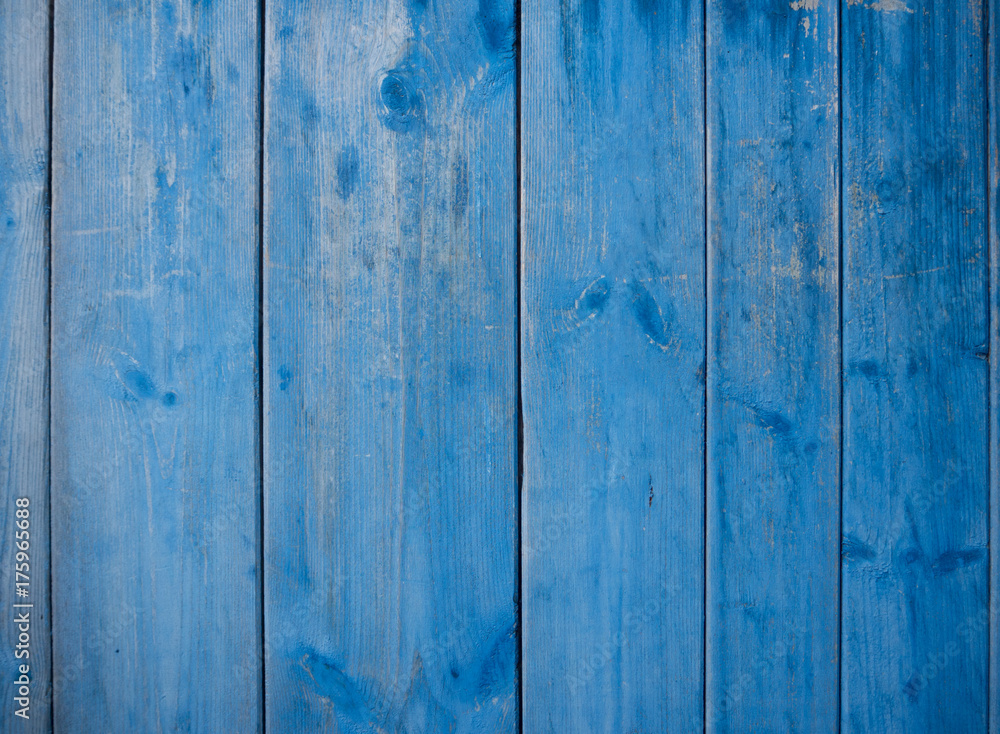 wooden fence background with a blue color wooden fence background with a blue color