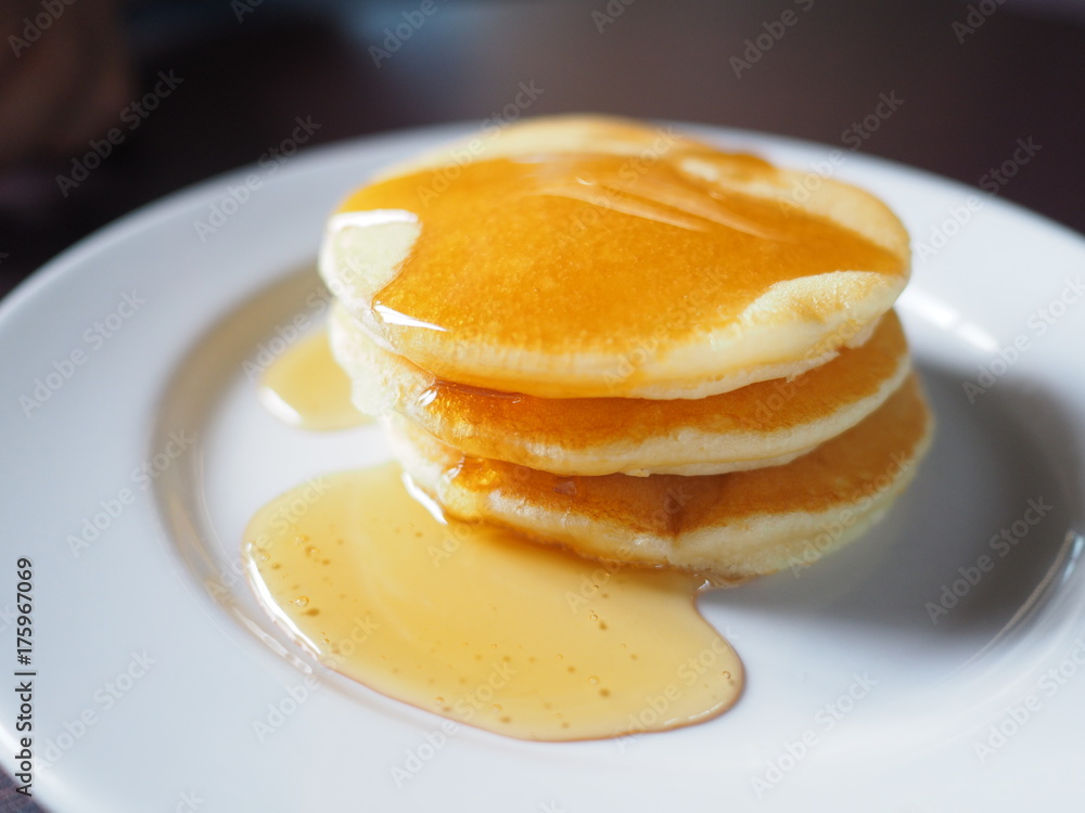 Stack of pancakes dessert with maple syrup. Stack of pancakes dessert with maple syrup.