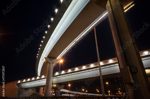 Large elevated traffic highway after the sunset