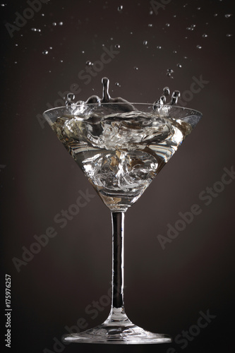 Cocktail Splashes Serie in 5 different colors with an Olive making different shapes in the martini: Grey