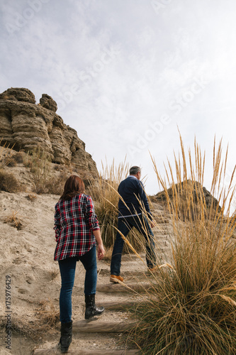 Mid Adult Couple in a Desertic Landscape