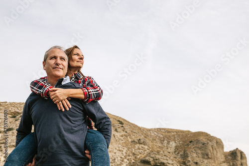 Mid Adult Couple in a Desertic Landscape