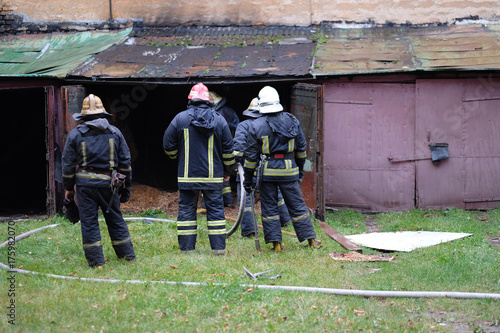 Team firefighters in place after fire extinguishment