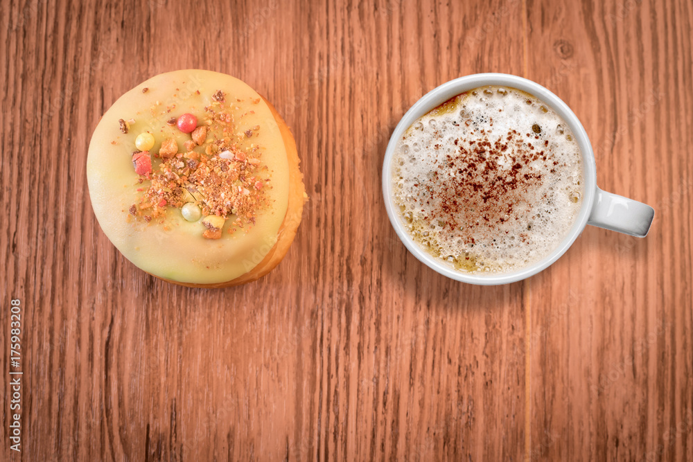 Drinking espresso and eating donut Drinking espresso and eating donut