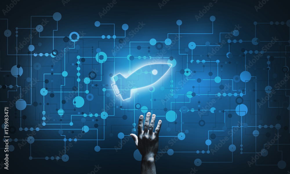 Technology idea concept with glowing rocket icon and touching it finger