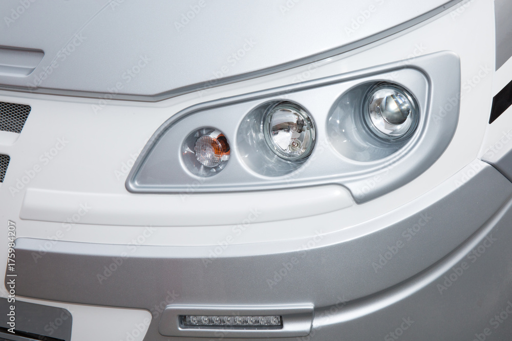 Closeup point on Headlight lamp car front light of van or truck