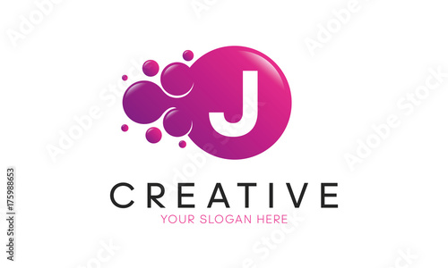 Dots Letter J Logo. J Letter Design Vector with Dots.