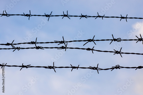 Barbed wire in beautiful view, with a beautiful sky backdrop dur