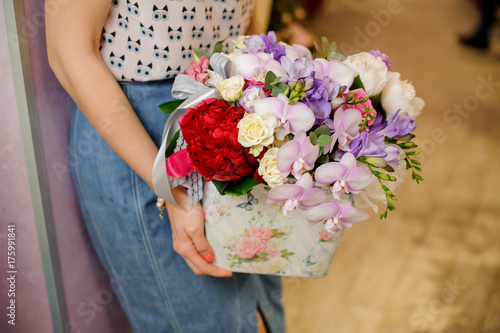 Wallpaper Mural Little pretty basket with beautiful flower composition Torontodigital.ca