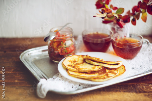 Romantic Breakfast by the window - pancakes and tea