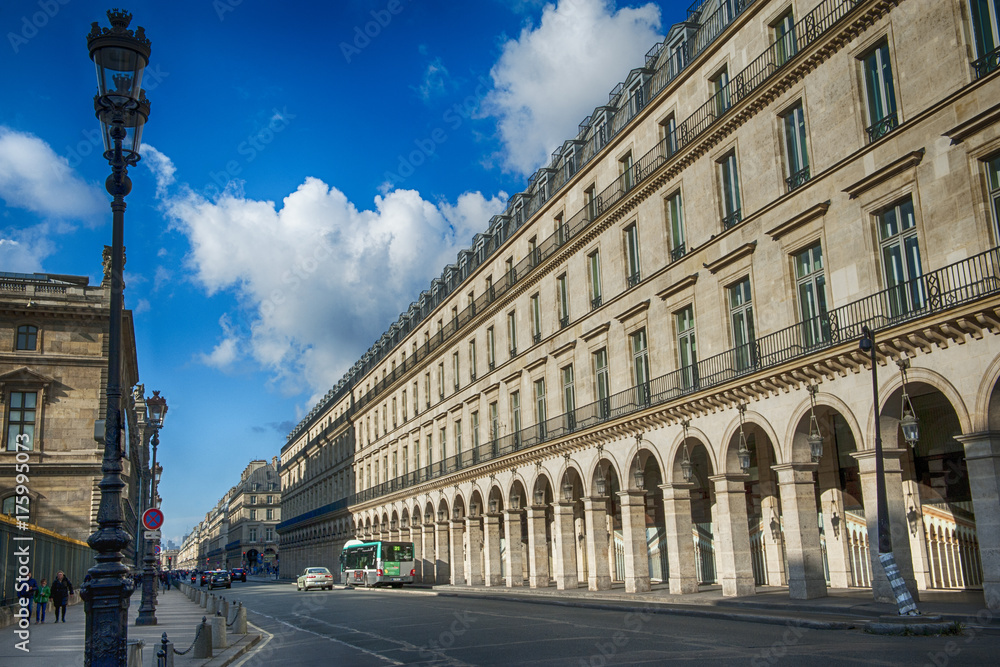 A perspective view of Rue de Rivoli in front of the Louvre Museum on a sunny day in November 2016 in Paris.