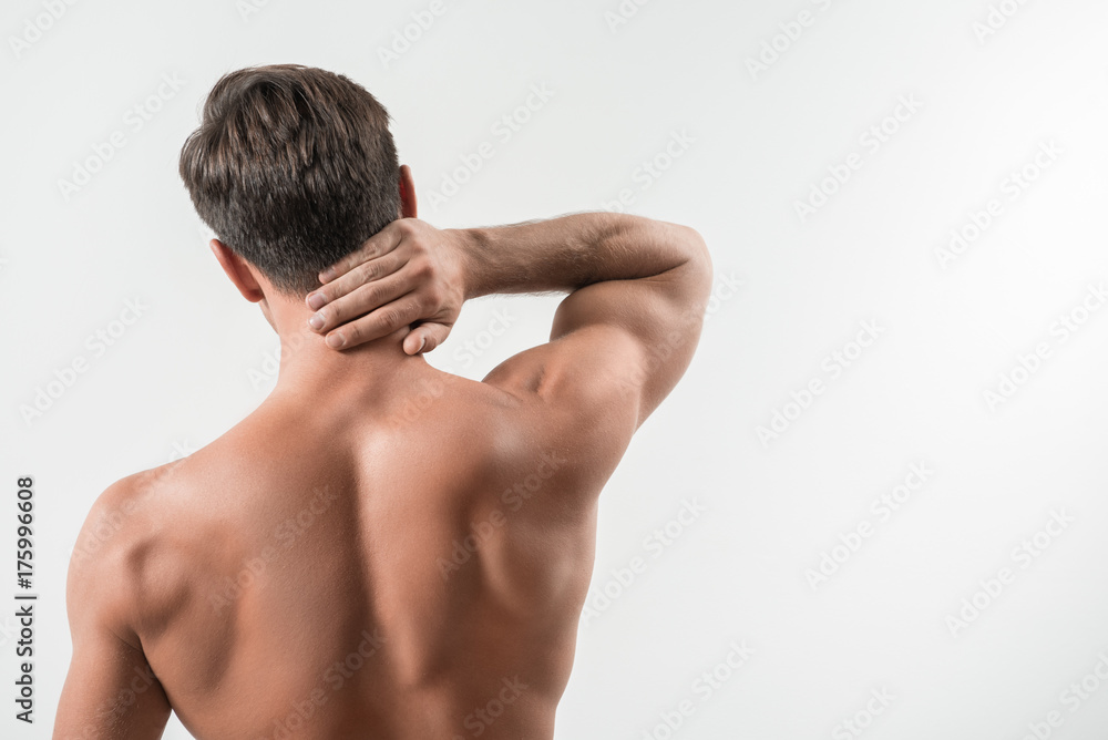 Charming sexual man is suffering from ache