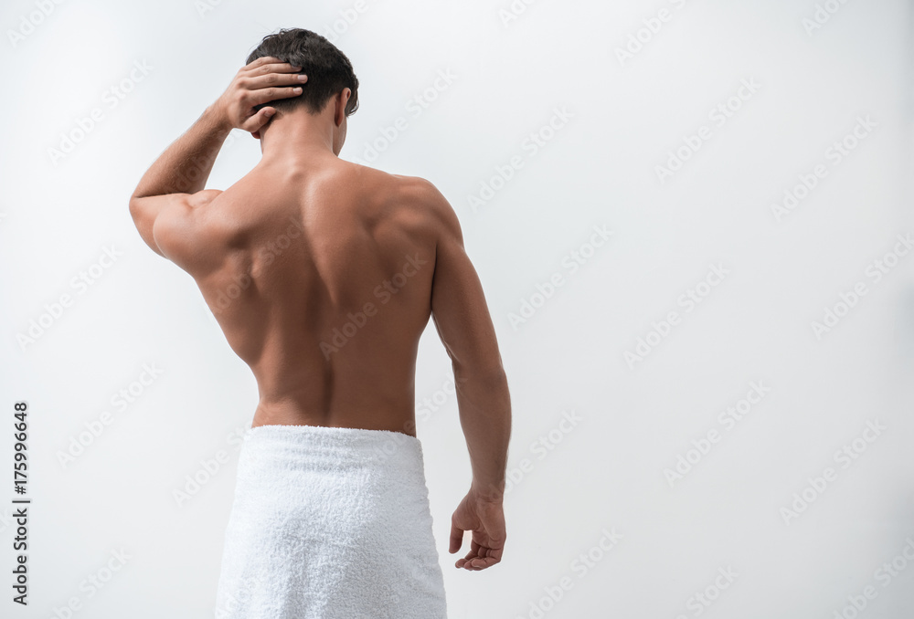 Obraz premium Sexual cute guy is suffering from migraine