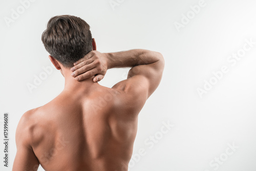 Charming sexual man is suffering from ache