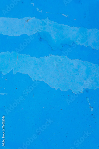 colored texture of a natural aged background of a painted surface. bottom surface of a boat close-up macro image