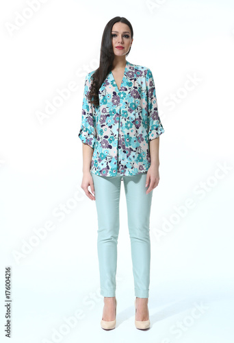 indian model in printed summer blouse and blue jeans  clothes full body length photo in stiletto heels isolated on white photo