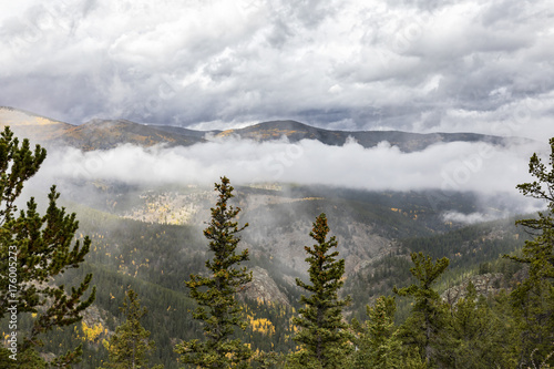 Stormy weather and low clouds over the Mt. Evans Wilderness Area near Idaho Springs, Colorado, on a fall day.