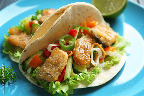 Plate with delicious fish tacos, closeup