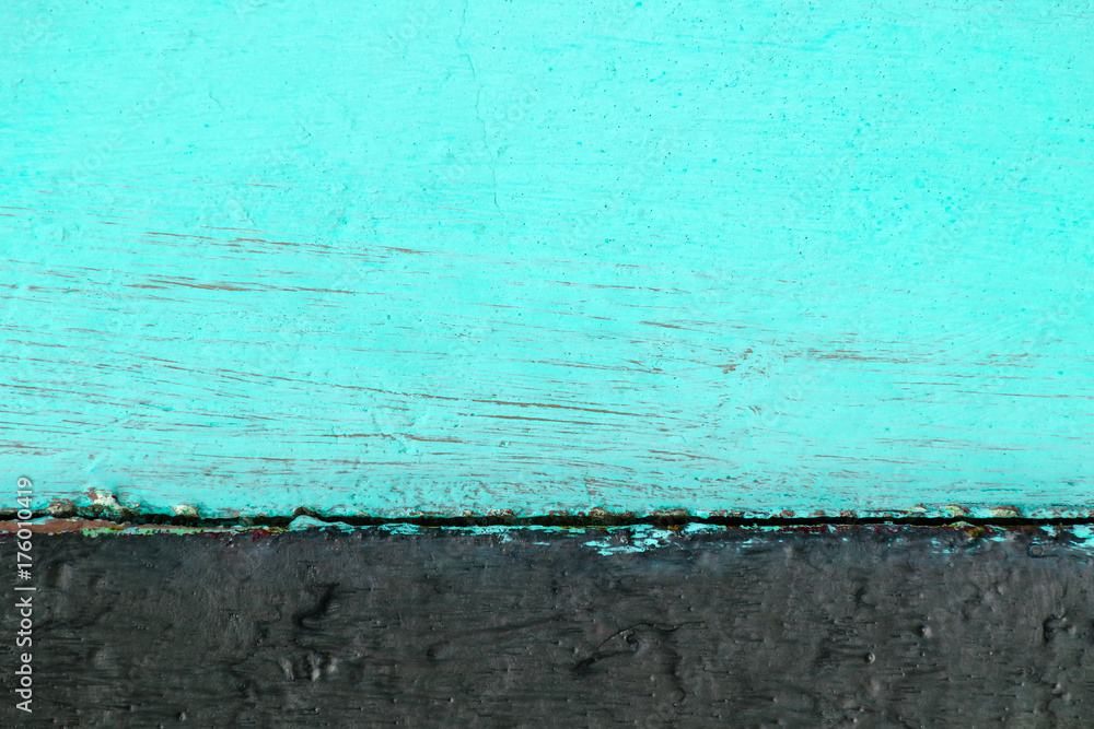 Two-tone wooden background consisting of turquoise color with black. Two-tone wooden background consisting of turquoise color with black.