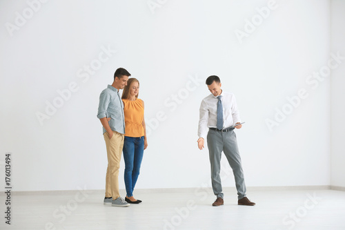 Real estate broker showing ...