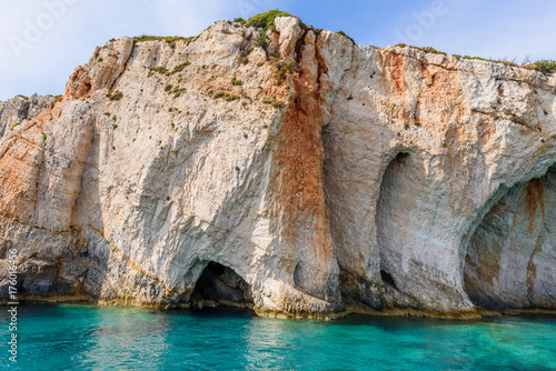 Famous Blue Caves and amazing rocks near Skinari Cape. Zakynthos Island, Greece.