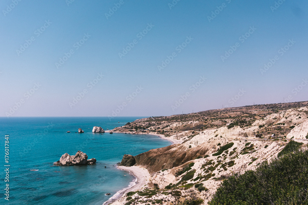 Beautiful wild beach with clear turquoise water and rocks. Cyprus.