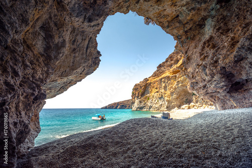 Amazing summer view from a cave at Iligas beach with magical turquoise waters, South Chania, Crete, Greece. © gatsi