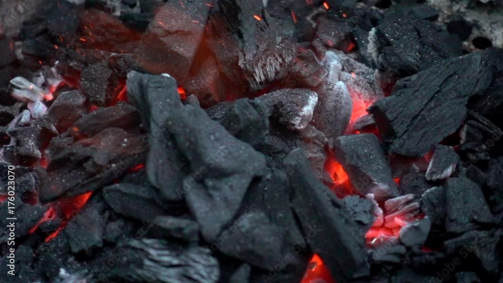 Video in slow motion of coal burning in a barbecue. Video in slow motion of coal burning in a barbecue.