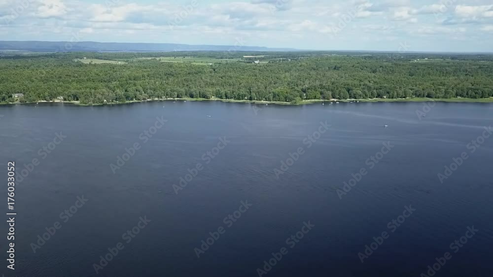 Lake on summer day -blue clouds - aerial shot Lake on summer day -blue clouds - aerial shot