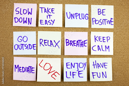 A yellow sticky note writing, caption, inscription Slow down, take ir easy be positive go outside relax breathe keep calm love what you do, do what you love, motivational concept on sticky notes