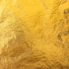 Gold foil leaf metallic wrapping paper shiny texture background for wall paper decoration element