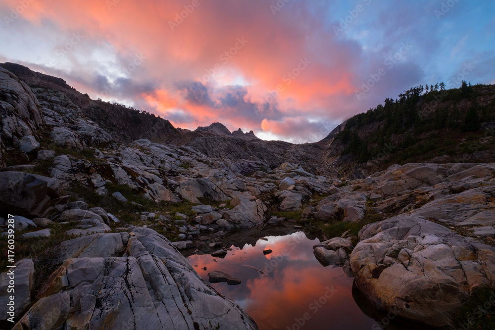 Sunset at Gothic Basin In the Northern Cascades With Reflection in Tarn