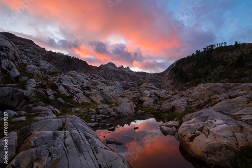 Sunset at Gothic Basin In the Northern Cascades With Reflection in Tarn