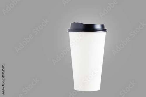 coffee cup on gray background.