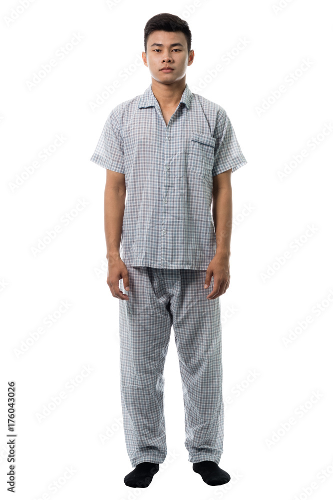 Handsome man in pajamas close up portrait studio on white background Handsome man in pajamas close up portrait studio on white background