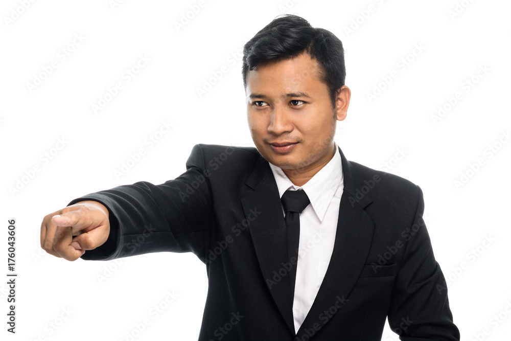 Portrait of a businessman pointed the finger to left side. Isolated on white background Portrait of a businessman pointed the finger to left side. Isolated on white background
