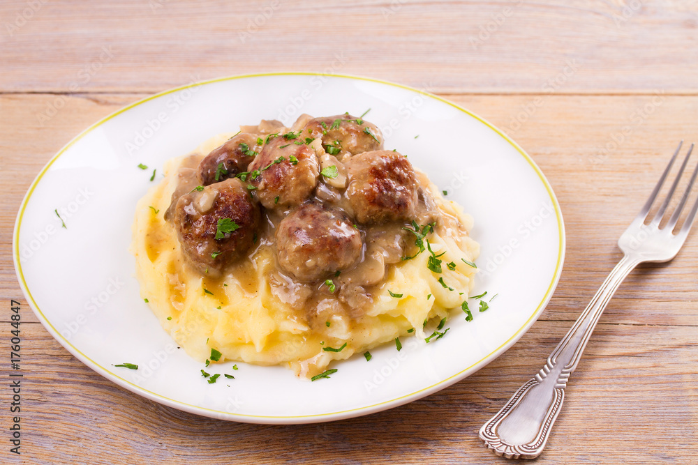 Beef meatballs with mushroom gravy on mashed potato Beef meatballs with mushroom gravy on mashed potato